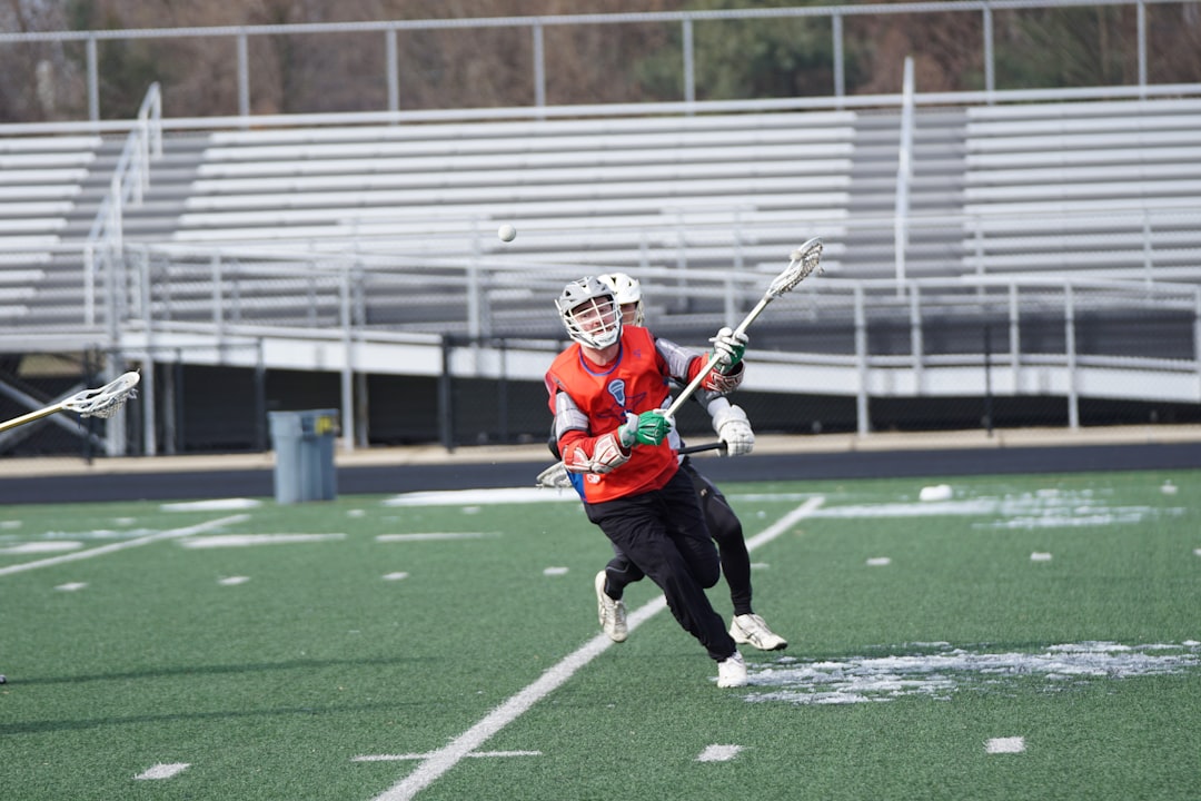 Lacrosse player in wet weather conditions