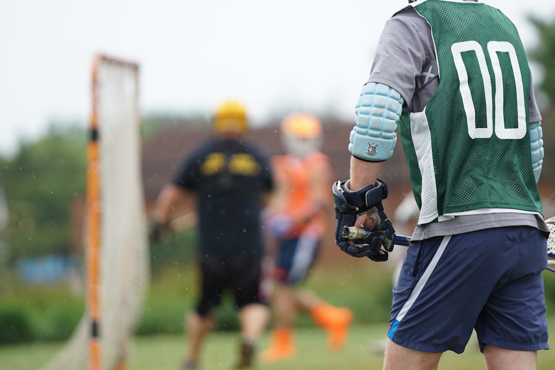 Defensive player wearing arm protection