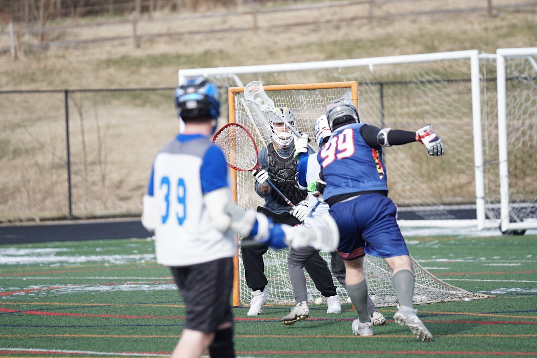 Lacrosse goalie making save